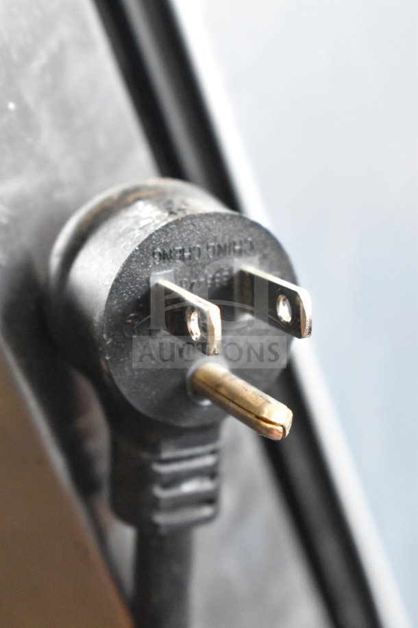Close-up of the 115V power plug for True T-23F-HC Commercial Single Door Reach In Freezer, model T-23F-HC.