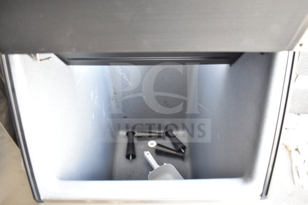 Brand new 2025 Ice-O-Matic B42 ice storage bin, holds 351 lbs, slight exterior scratches, includes scoop and fittings.