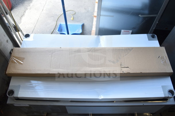Brand new ServIt 423GST3WELP three-pan propane steam table, 10,500 BTU, slight scratch and dent, boxed, with undershelf.