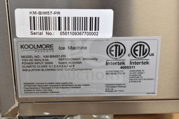 Brand new KoolMore KM-BIM57-PR ice maker. Panel ready, 57 lbs/24hr capacity. 115V, 1 phase. Features model plate with specs.