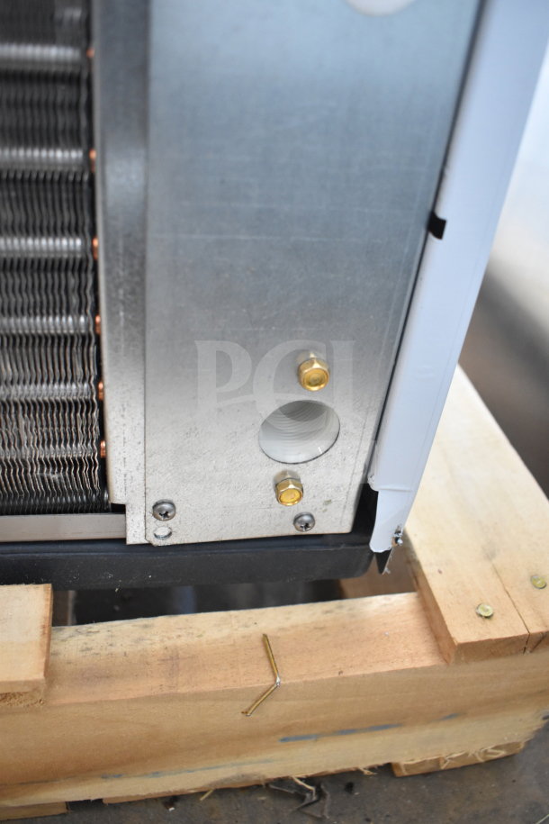 BRAND NEW SCRATCH AND DENT Scotsman MC0330MAX-1A 30" Medium Cube Ice Machine, 400 lb capacity, on wooden pallet.