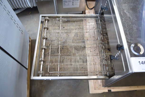 BRAND NEW SCRATCH AND DENT! Cooking Performance Group 351ICOED Countertop Impinger Oven, shown with open conveyor tray. 240V, 1 Phase.
