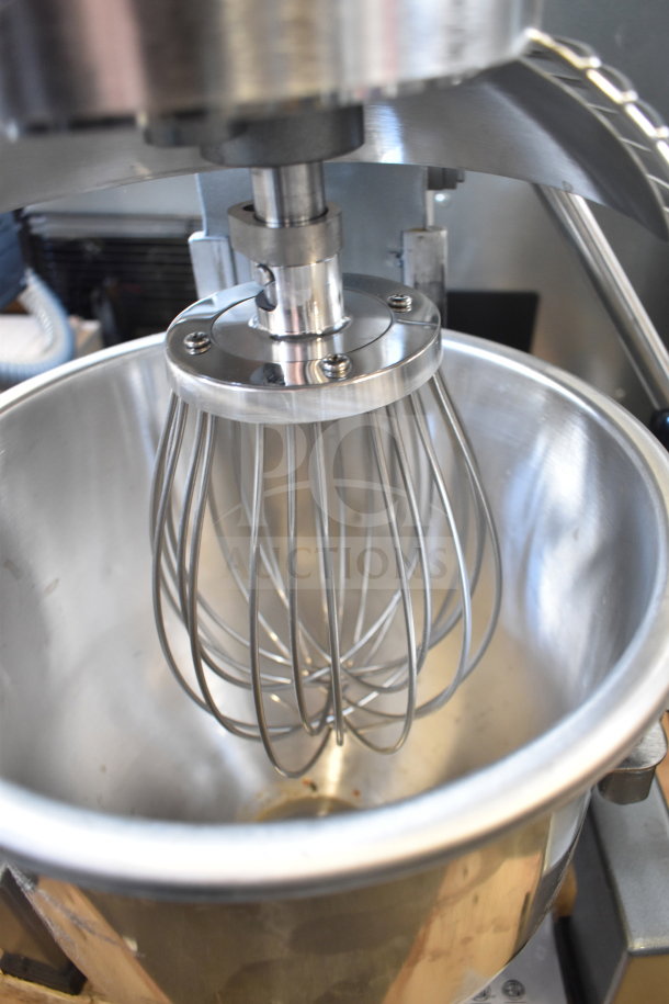 Brand new Avantco 177MX10H countertop mixer, 10-quart capacity, includes bowl, guard, paddle, whisk, and dough hook.