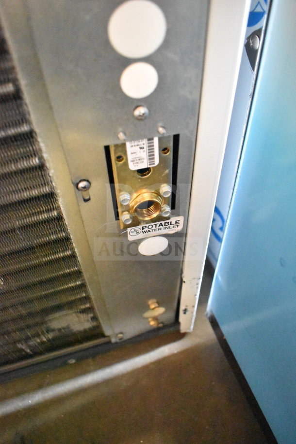 BRAND NEW Scotsman MC0330SAX-1A ice machine, 365 lb capacity, visible potable water inlet. Some minor scratches.