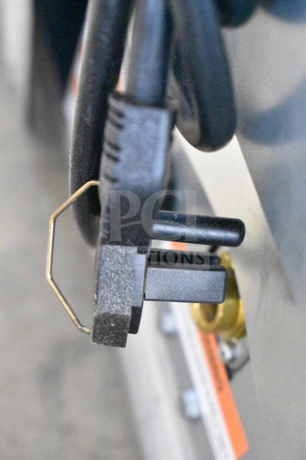 Close-up view of the power cord and connector for the 2026 Manitowoc UDP0065A-161 NEO undercounter ice machine.