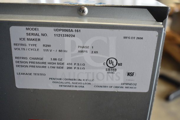 Label on 2026 Manitowoc UDP0065A-161 ice machine, detailing 115V, phase 1, 3.88 oz refrigerant charge, tested leakage.