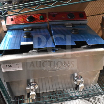 Avantco 177F202 dual tank fryer, brand new, 30 lb. capacity, electric, two fry baskets and lids, minor cosmetic dents.