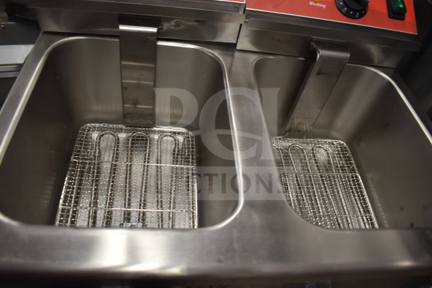Brand new Avantco 177F202 dual tank countertop fryer, 30 lb capacity, with two fry baskets and lids. 208-240V, 1 phase.