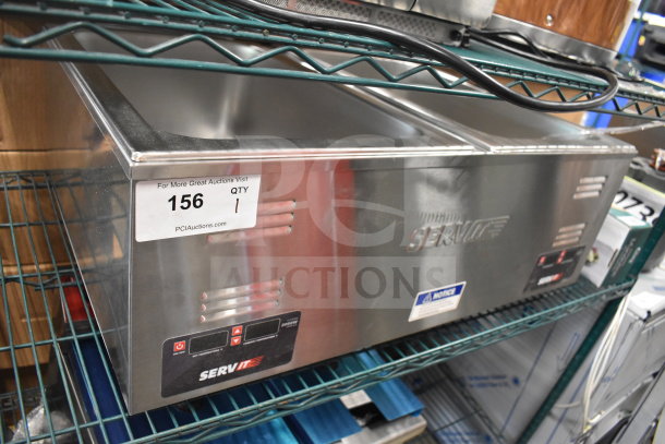 Brand new ServIt 423FW200D dual well electric food warmer, digital controls, scratch and dent, 12"x20", 120V, model tag visible.