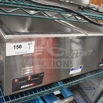 Brand new ServIt 423FW200D dual well electric food warmer, digital controls, scratch and dent, 12"x20", 120V, model tag visible.