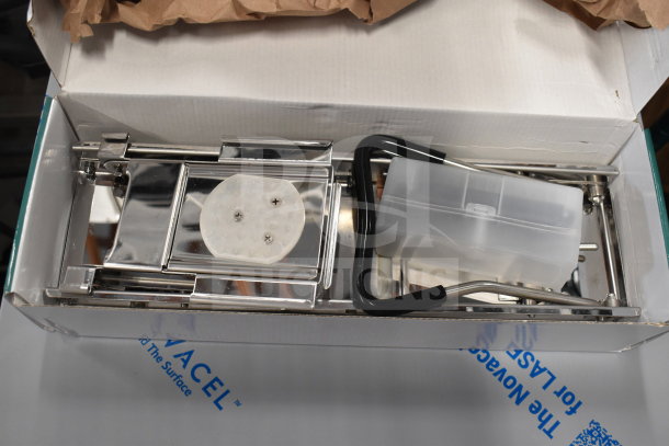 BRAND NEW SCRATCH AND DENT! Stainless steel mandoline with built-in and interchangeable blades, boxed, slight damage.