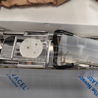 BRAND NEW SCRATCH AND DENT! Stainless steel mandoline with built-in and interchangeable blades, boxed, slight damage.