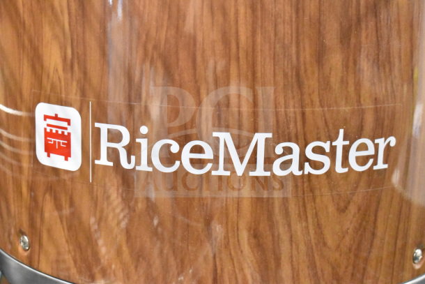 Brand new RiceMaster Town 56916W, 72-cup rice warmer in woodgrain finish. 120 volts, 1 phase. Scratch and dent condition.