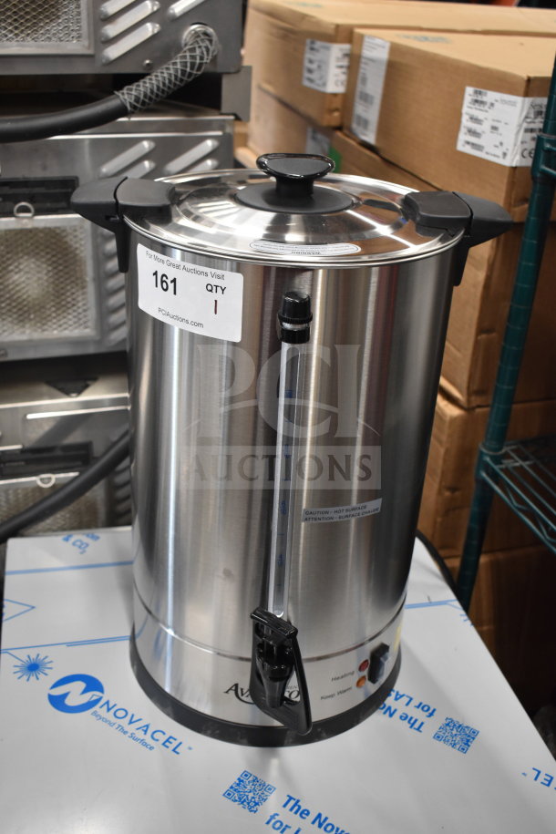 Brand new Avantco 100-cup stainless steel coffee urn with gauge, 120V, 1 phase. Auction tag visible.