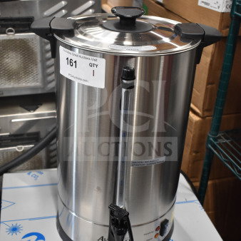 Brand new Avantco 100-cup stainless steel coffee urn with gauge, 120V, 1 phase. Auction tag visible.