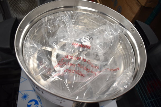 Stainless steel Avantco 177CU100ETL coffee urn, 100 cup capacity, in new condition, wrapped in protective plastic.