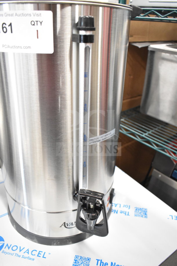 Alt text: Brand new Avantco 177CU100ETL coffee urn, 100 cup capacity, double wall stainless steel, 120V, with caution label.
