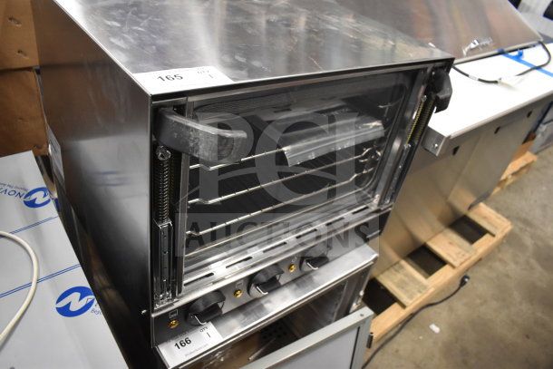 Brand new Vollrath COV-120-HS half-size convection oven, 120V, 1 phase, with visible broken glass on the door.