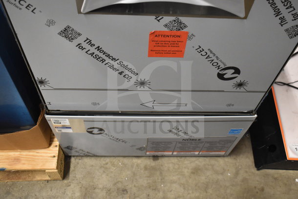 Brand new Noble 495LTUC24 undercounter dishwasher, low-temperature, 120V, 1 phase. Scratch and dent condition. Markings visible.