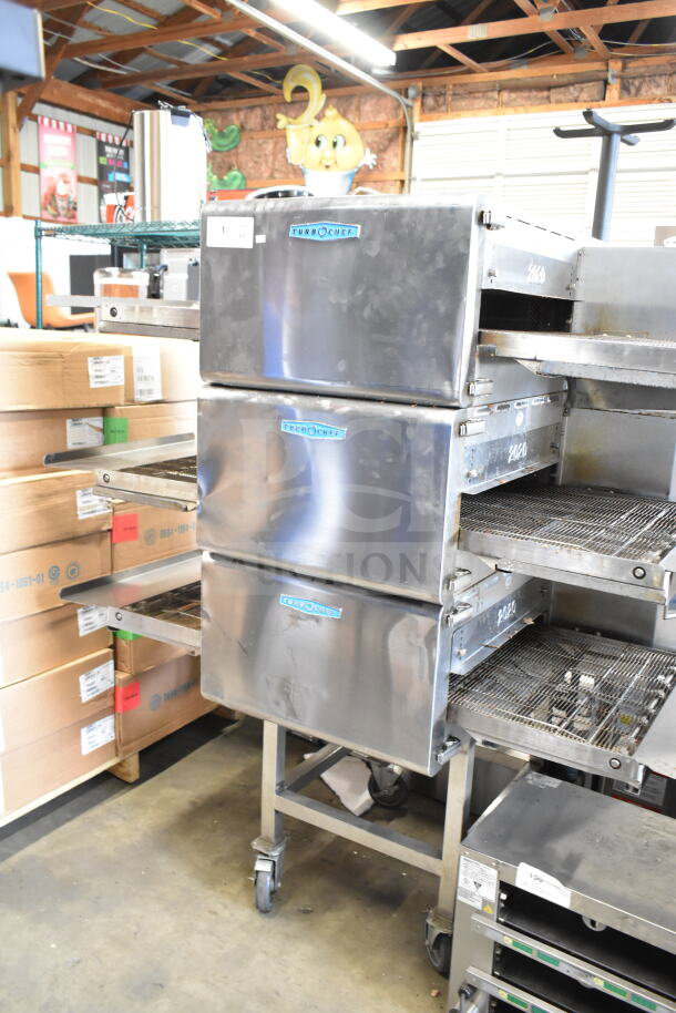 Three 2018 Turbochef HhC2020 electric conveyor ovens on a mobile stand. 208/240 Volts, 3 Phase. Visible brand logos.