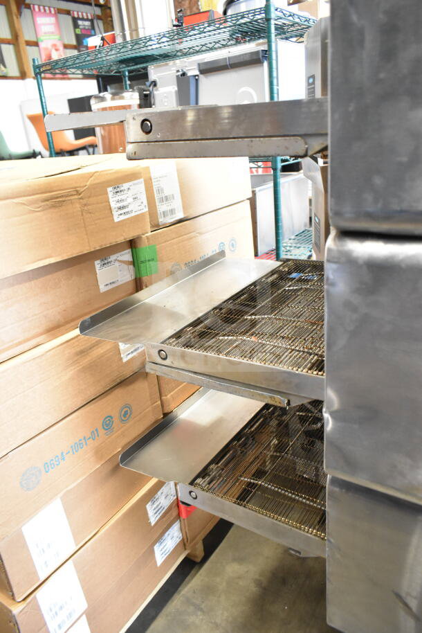 Turbochef HhC2020 commercial rapid cook oven with conveyor, equipment stand, and casters. 208/240V, 3 phase.
