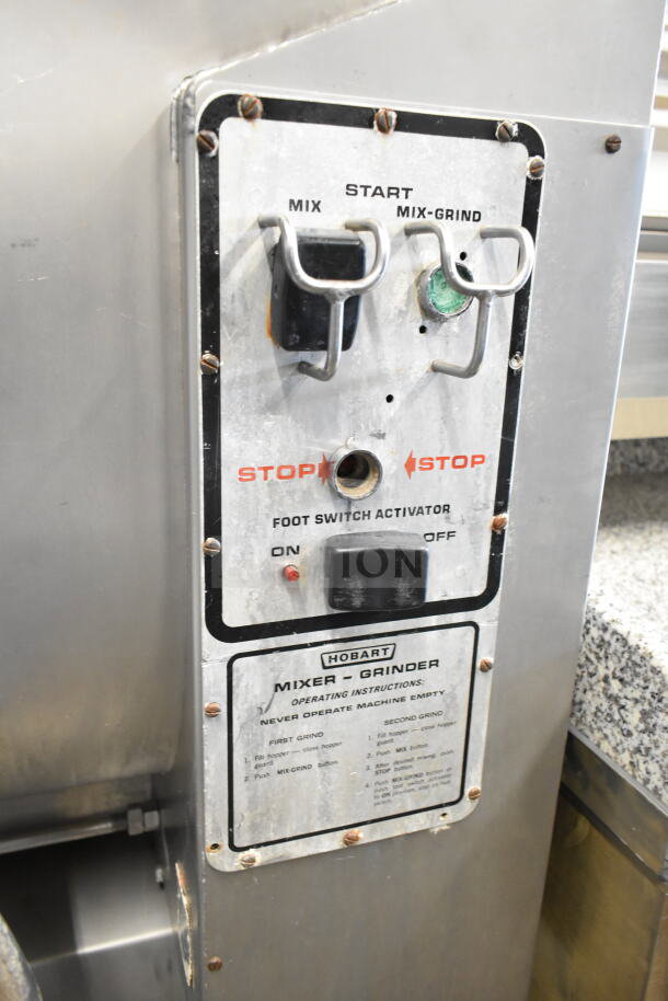 Hobart 4346 commercial meat mixer grinder with control panel, 200 volts, 3 phase, on casters. Visible operational instructions.