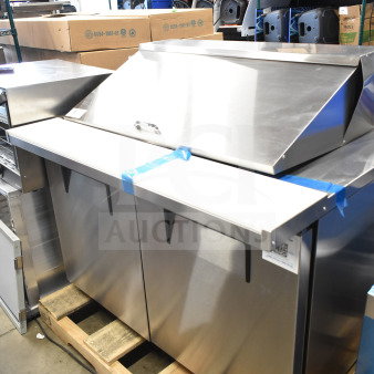 True TSSU-48-18M-B-HC commercial sandwich salad prep table in stainless steel, brand new with minor scratches, 115V, 1 phase.