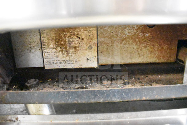 Imperial commercial 6-burner gas range label showing NSF certification, indicating prior use and industrial suitability.