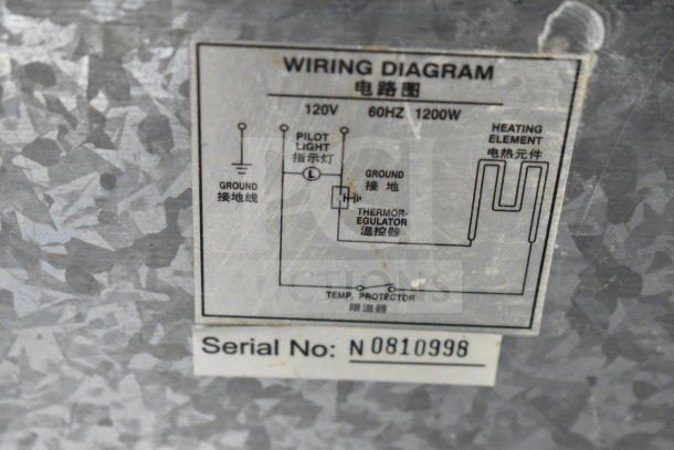 Adcraft FW-1200WF Countertop Food Warmer. Wiring diagram and serial number N0810998 visible on metal surface.