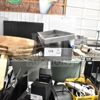 Nine varied items including metal bins, wooden paddles, and a gas regulator on a wire shelf. Tag indicates quantity nine.