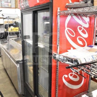 True GDM-33 Commercial 2 Door Cooler Merchandiser with Coca-Cola branding, glass doors, 115V, 1 phase; used condition.