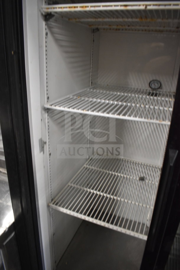 True GDM-33 commercial 2-door cooler, 115 volts, 1 phase. Interior wire shelves, temperature gauge, clean condition.