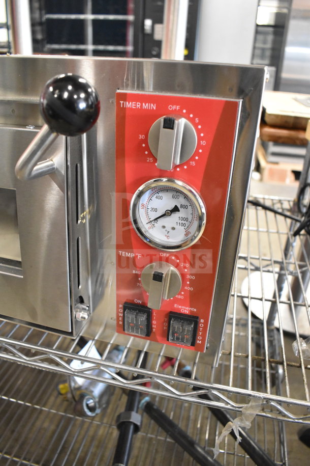 Brand new Avantco 177DPO18S commercial pizza oven, single deck, 120V, timer and temperature dials, countertop model.