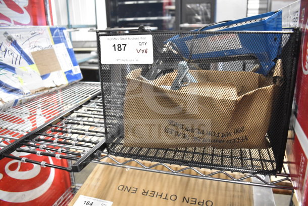 Brand new scratch and dent items including Yeler Plastic Film Sealer and metal black basket; auction label "187 QTY 6."