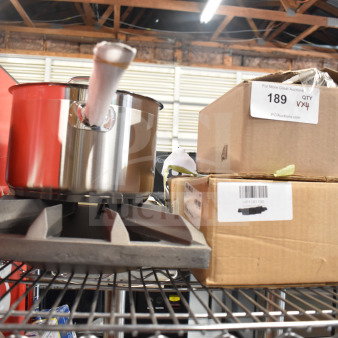 Brand new Vigor SS1 Series 7.6 Qt. stainless steel saucepan with aluminum-clad bottom, range grate, and boxed items.