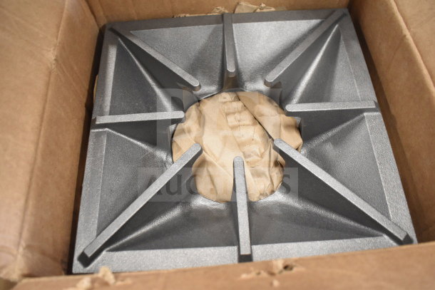 Alt text: Southbend HP1181100 range grate in box, brand new condition, metallic finish, surrounded by packing material.