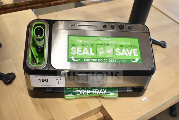 Brand new FoodSaver V4840 vacuum sealer with minor scratches. Features 2-in-1 sealing, 120 volts, 1 phase. Includes drip tray.