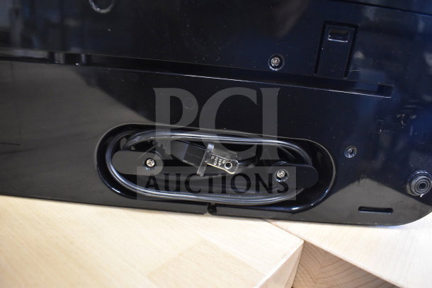 FoodSaver V4840 vacuum sealer base with power cord stored neatly; brand new, described as "scratch and dent."