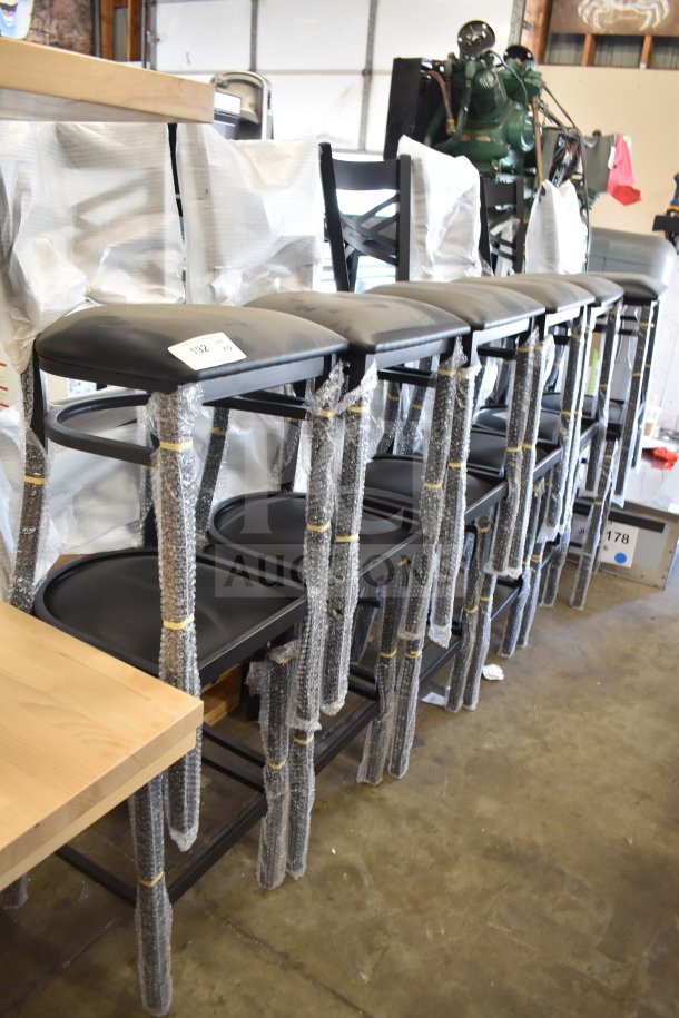 12 new Lancaster Table & Seating 164BCROSSFRN black cross back bar chairs with seat cushions, in packaging, minor scratches.