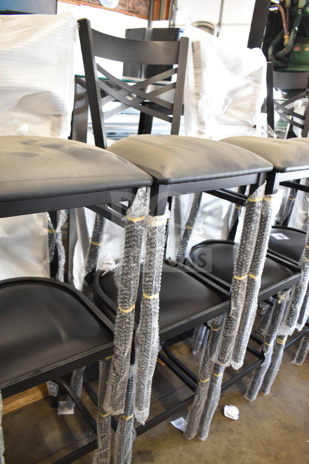 12 new Lancaster Table & Seating 164BCROSSFRN black cross-back bar chairs with cushions. Scratch and dent condition.