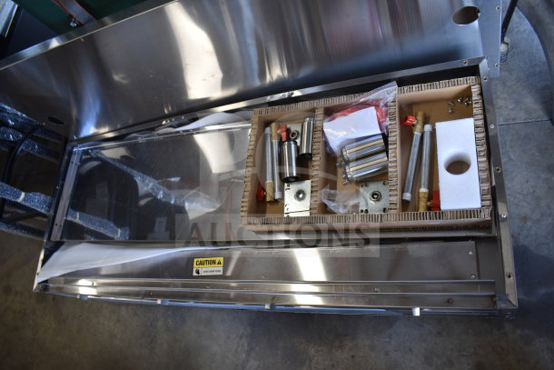 Brand new ServIt 423EST4WSPBH steam table, four-pan sealed well, partially enclosed base, includes accessories, 208/240V, 1-phase.