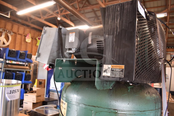Champion CAPRSA23 Air Compressor, 460 Volts, 3 Phase, wear on green tank, visible warning labels, model and specs.