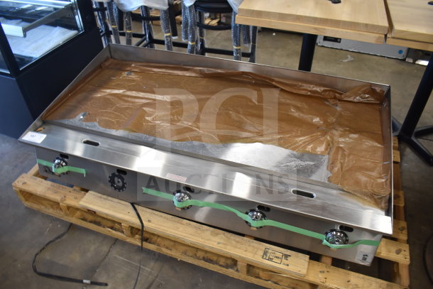 Brand new Star Ultra Max BG-860TA-LP 60" commercial griddle with snap-action thermostatic controls, 150,000 BTU, scratch and dent condition.