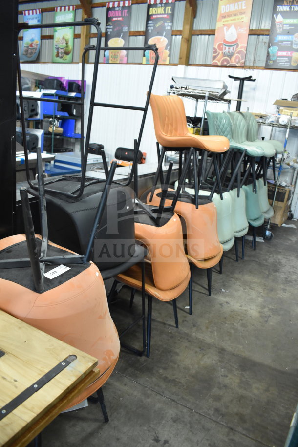 20 assorted chairs, colors orange, black, and green. Modern design, metal legs. Bulk auction lot.