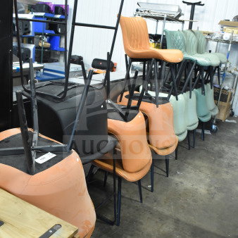 20 assorted chairs, colors orange, black, and green. Modern design, metal legs. Bulk auction lot.