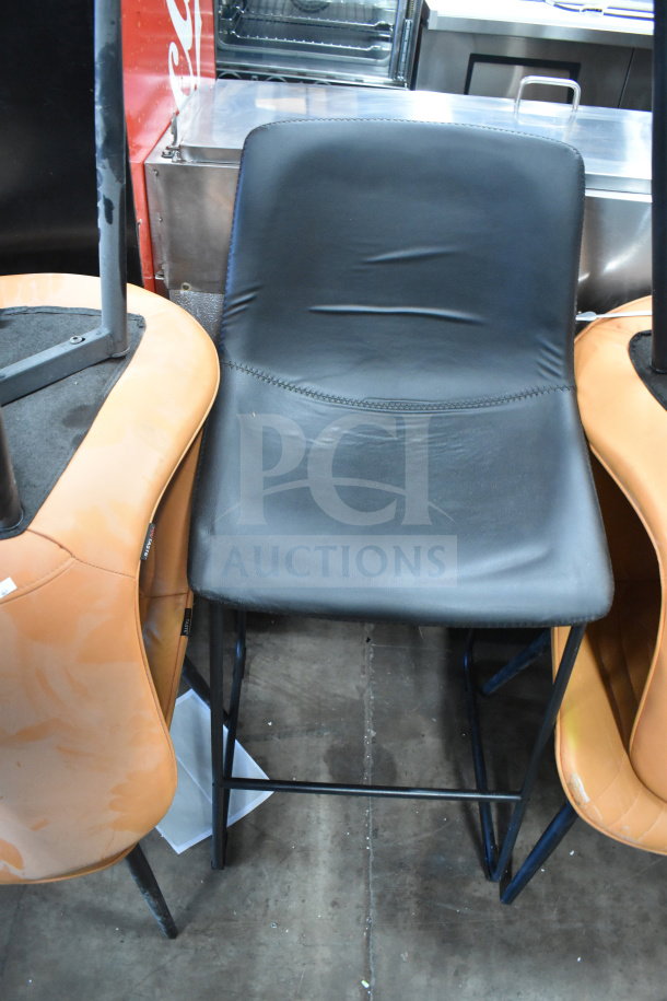 20 assorted chairs, including orange, black, and green. Mixed designs, slight wear visible. Auction lot, 20 units.