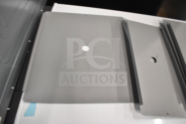 Five gray metal panels, new scratch and dent condition. Each panel has a pre-drilled hole, with visible surface marks.