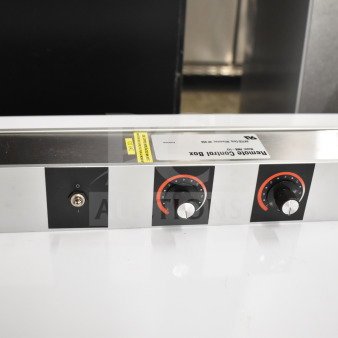 "Brand new Hatco RMB-14V remote control box, silver with dual dials, slight scratches. Label indicates model and specs."