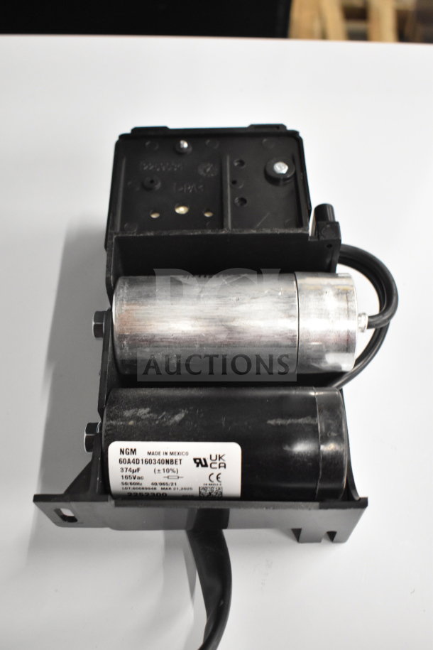 BRAND NEW SCRATCH AND DENT C5KP00L 1272472 Unit, NGM 6044D160340NBET, 165V AC, tags indicate origin in Mexico.