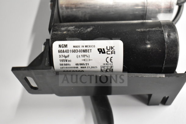 BRAND NEW C5KP00L 1272472 unit in scratch and dent condition. Visible label: "NGM 60A4D160340NBET, 374µF, 165Vac."
